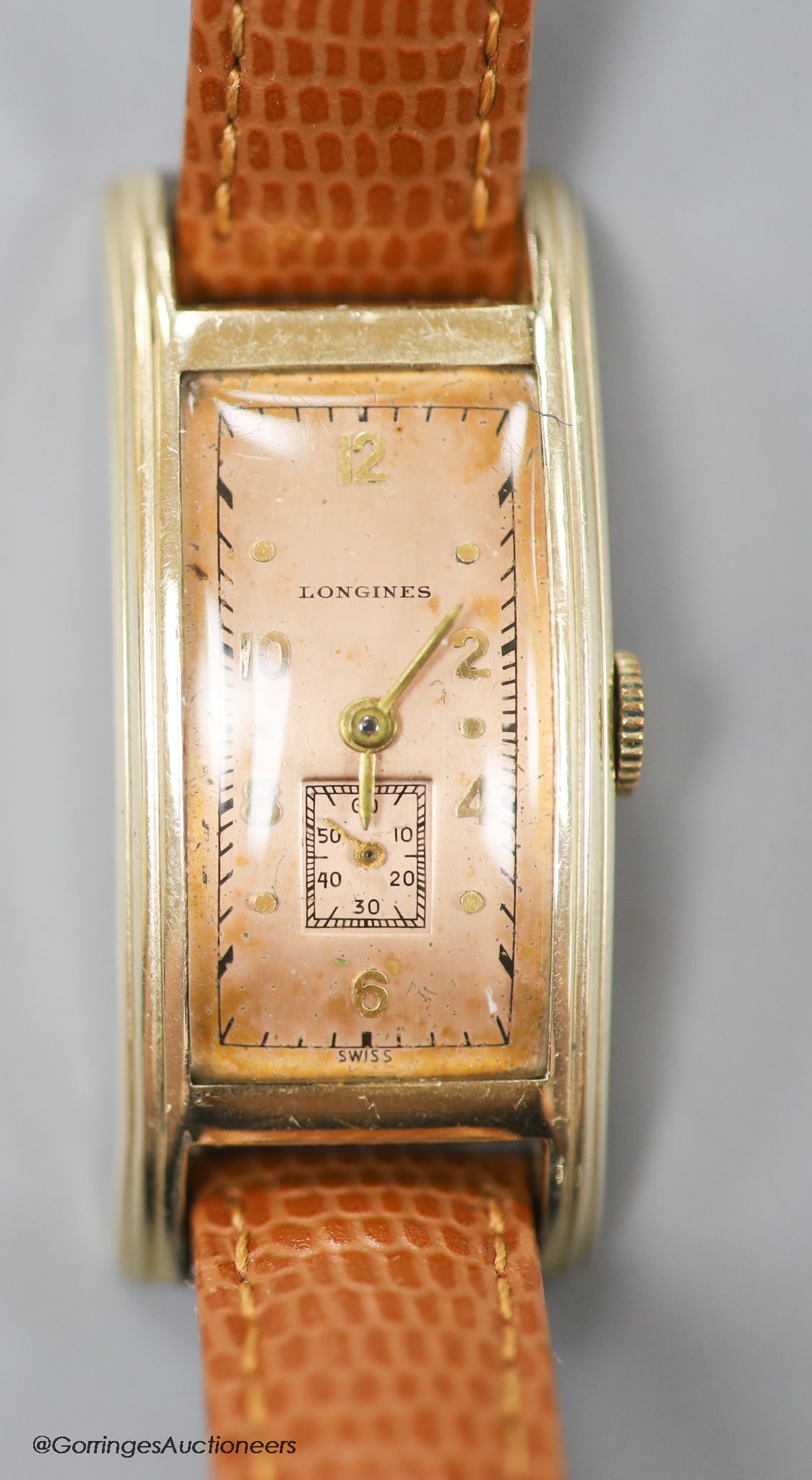 A gentleman's stylish 1930's 10k gold filled Longines manual wind rectangular dial wrist watch, on later leather strap, with subsidiary seconds.